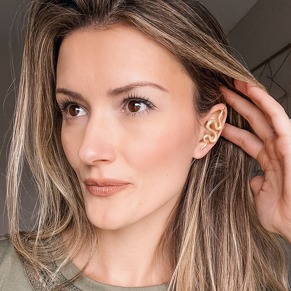 An Oreylo customer wearing their earrings