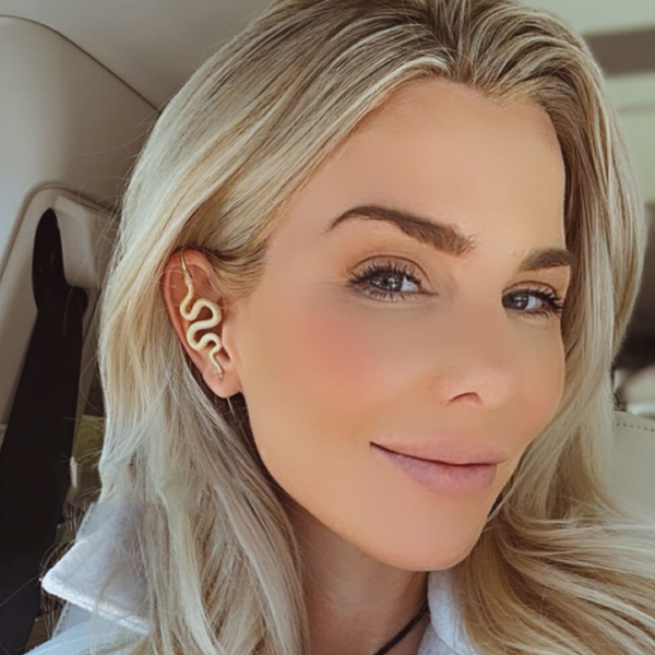 An Oreylo customer wearing their earrings