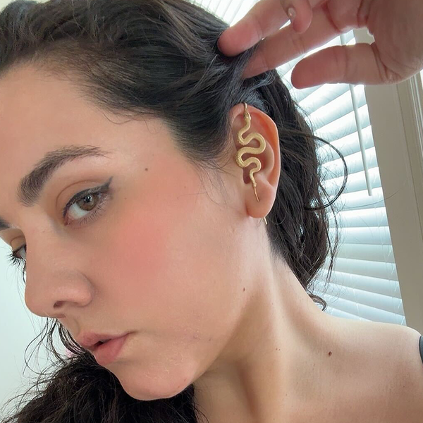 Oreylo customer wearing earrings