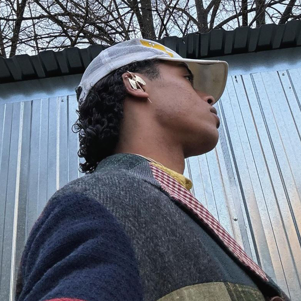 Oreylo customer wearing earrings