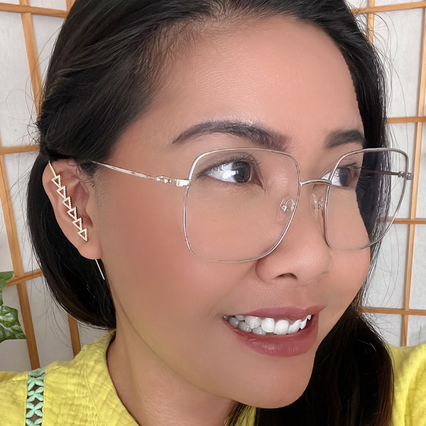 Oreylo customer wearing earrings