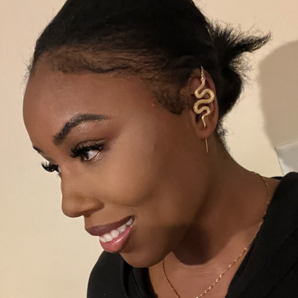 Oreylo customer wearing earrings