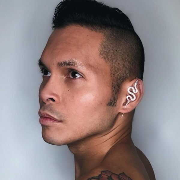 Oreylo customer wearing earrings