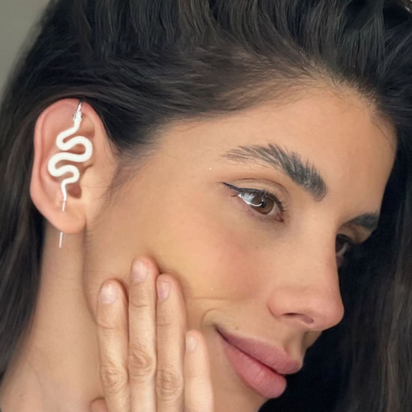 Oreylo customer wearing earrings