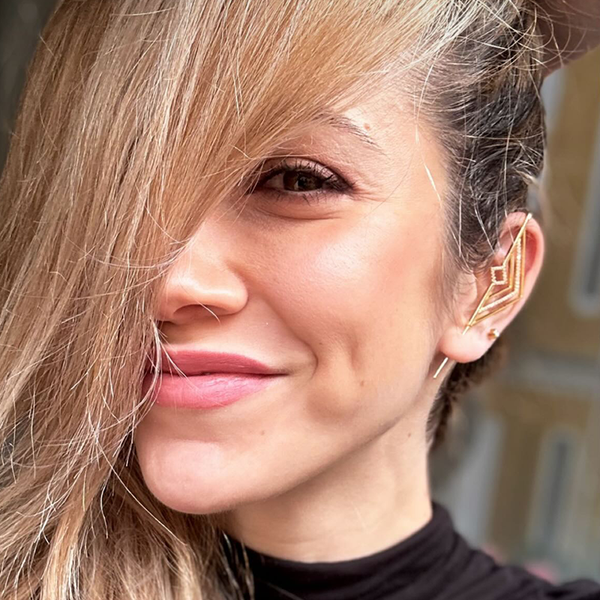 Oreylo customer wearing earrings