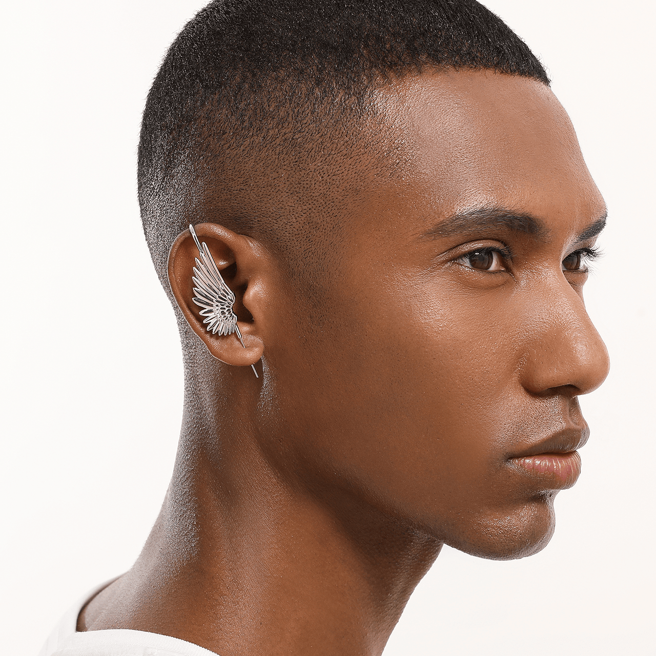 Male multiple ear used piercings