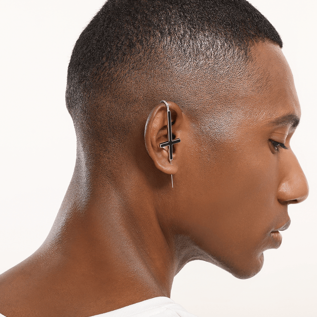 Multiple discernable ear piercings male