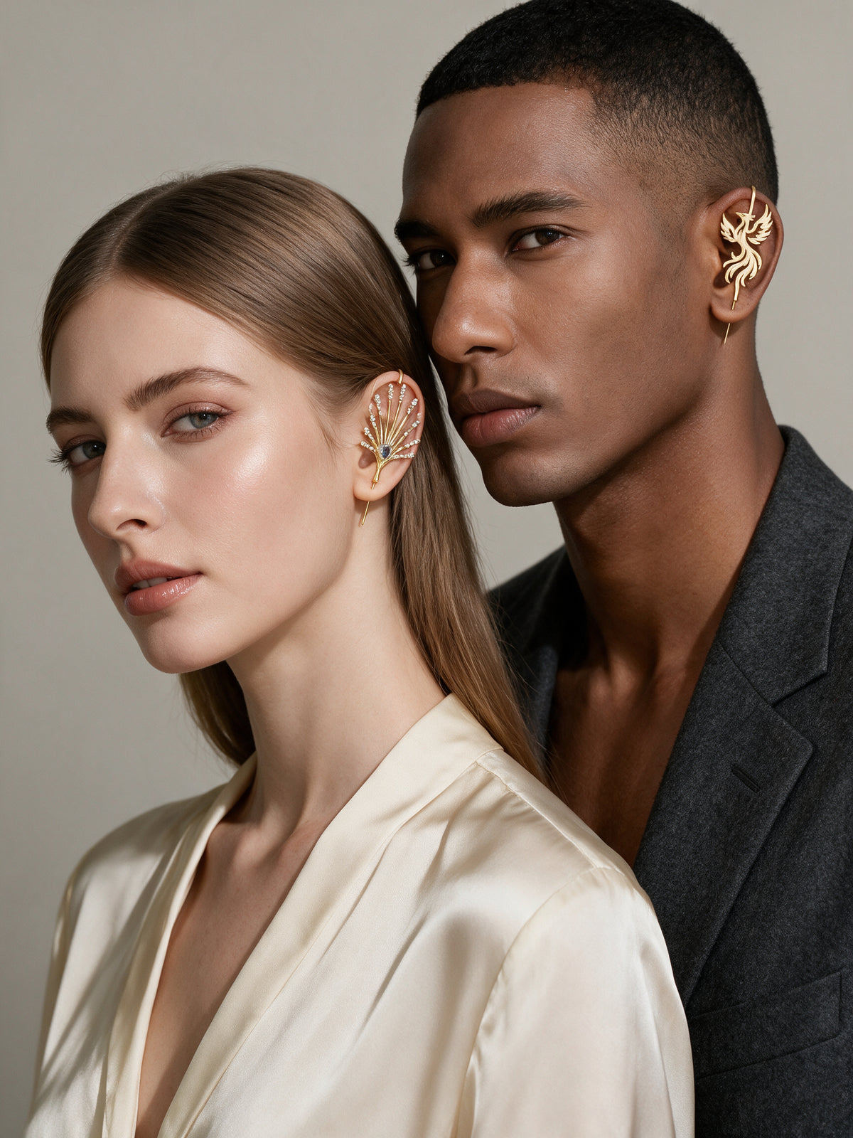 Two models wearing Oreylo statement ear hooks